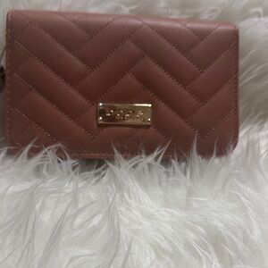 Bebe Quilted Mauve Crossbody Clutch with Gold Plaque